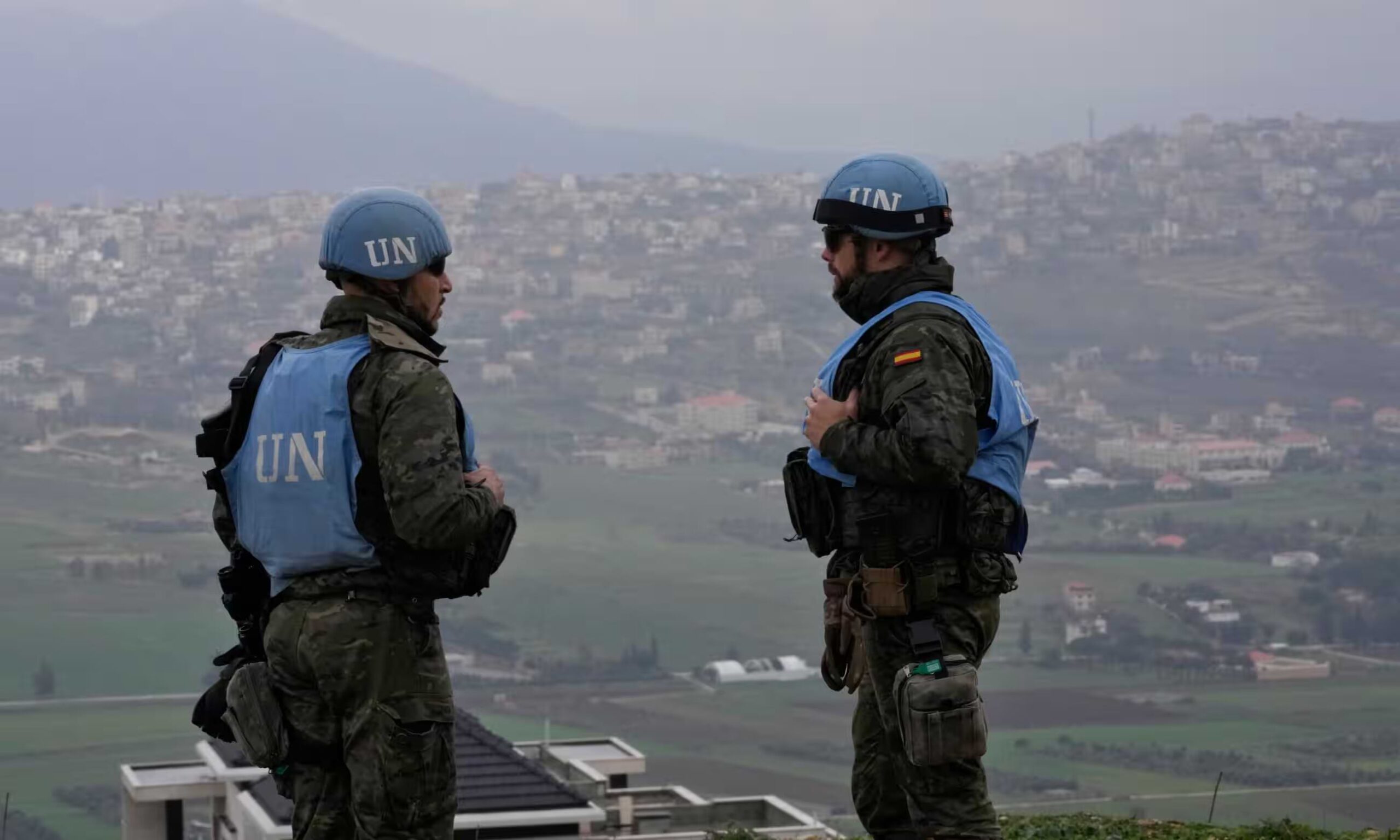 Spanish UN peacekeepers stand on a hill overlooking the Lebanese border villages with Israel in January this year. Photograph Hussein MallaAP