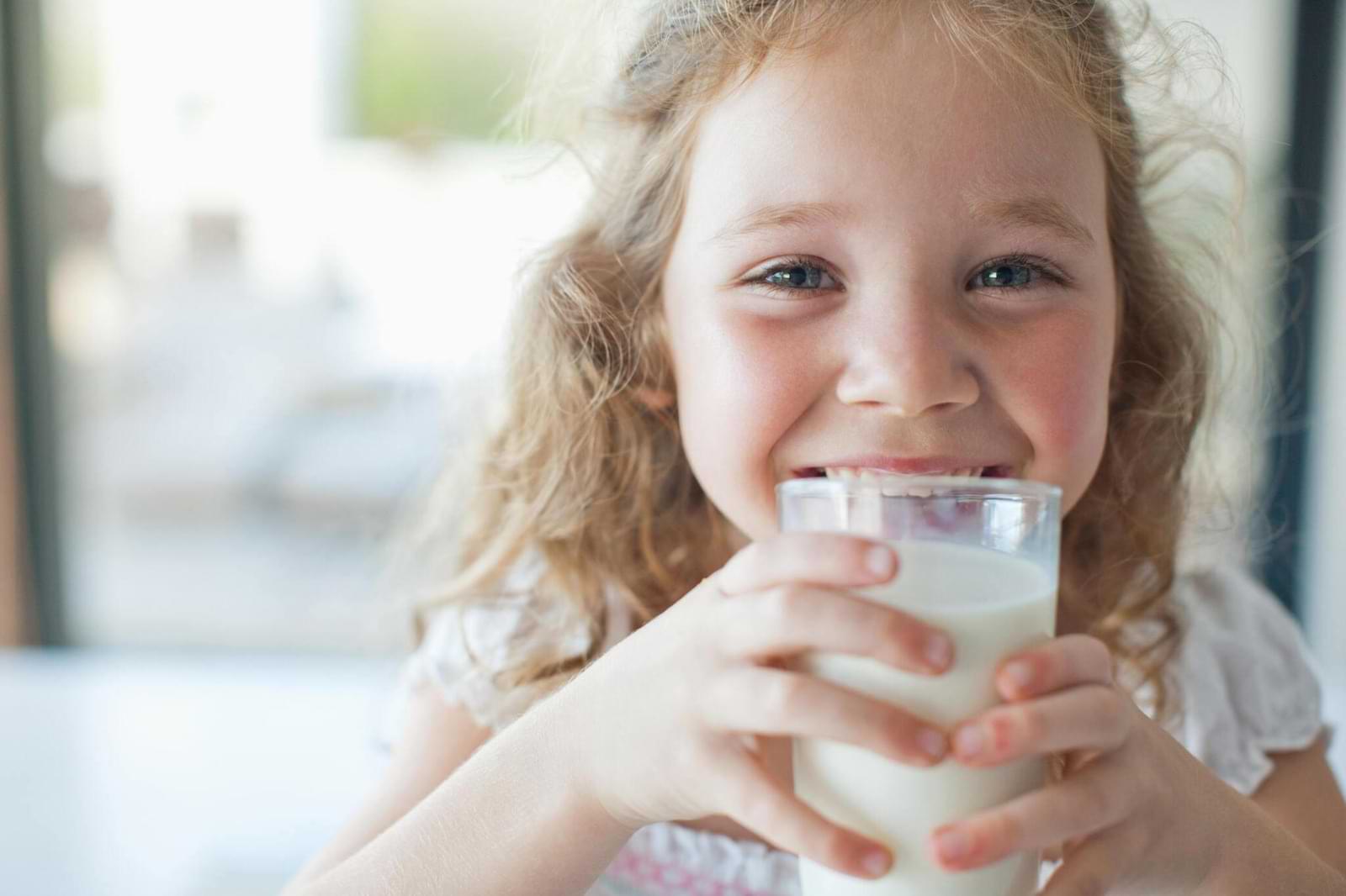 The baby is drinking milk